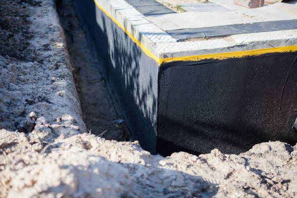 Professional Wet Basement Repair technician working in Marion, NY